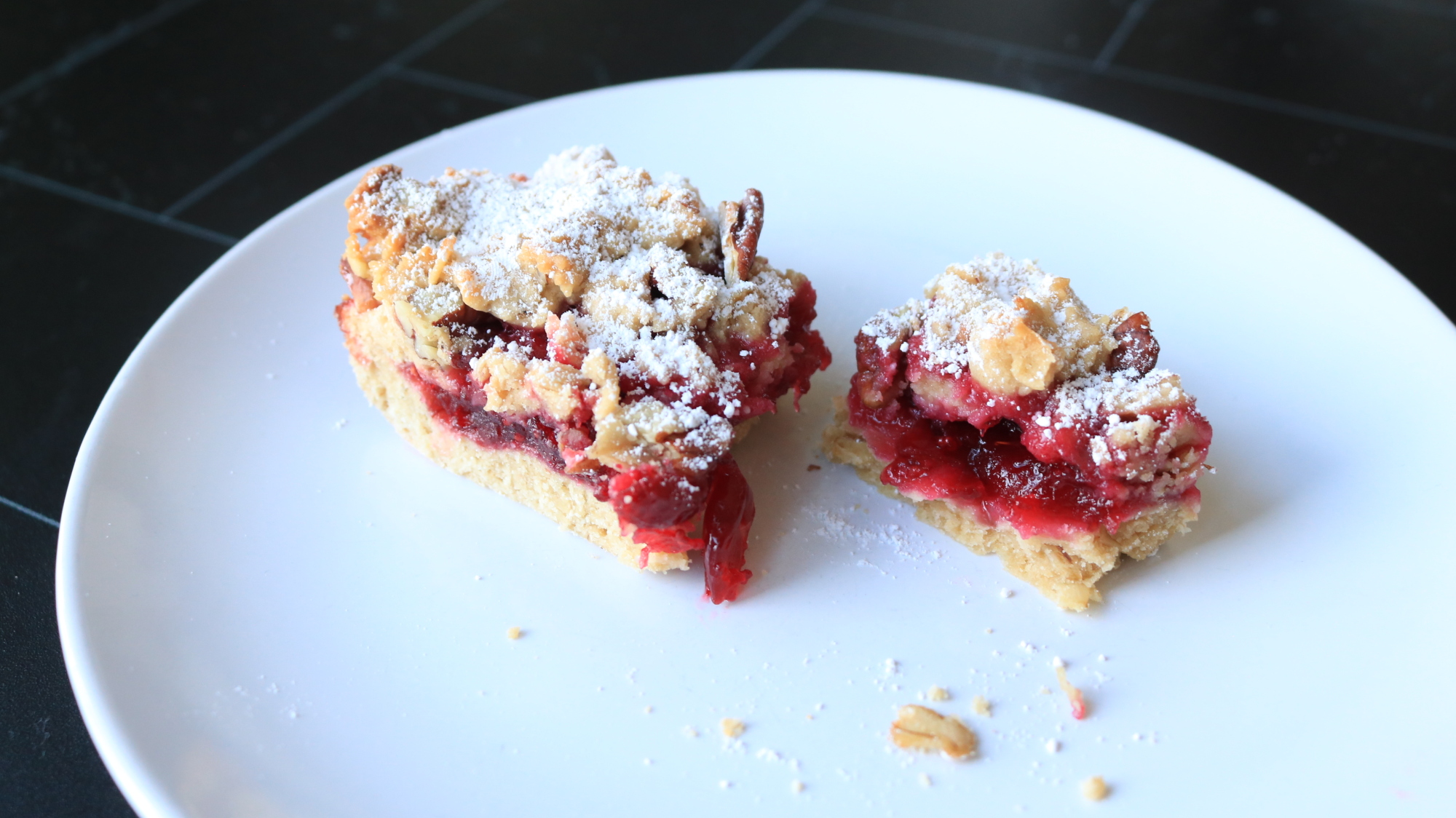 One broken jam bar on a plate.