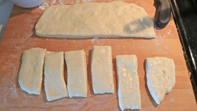Bread dough cut into rectangles.